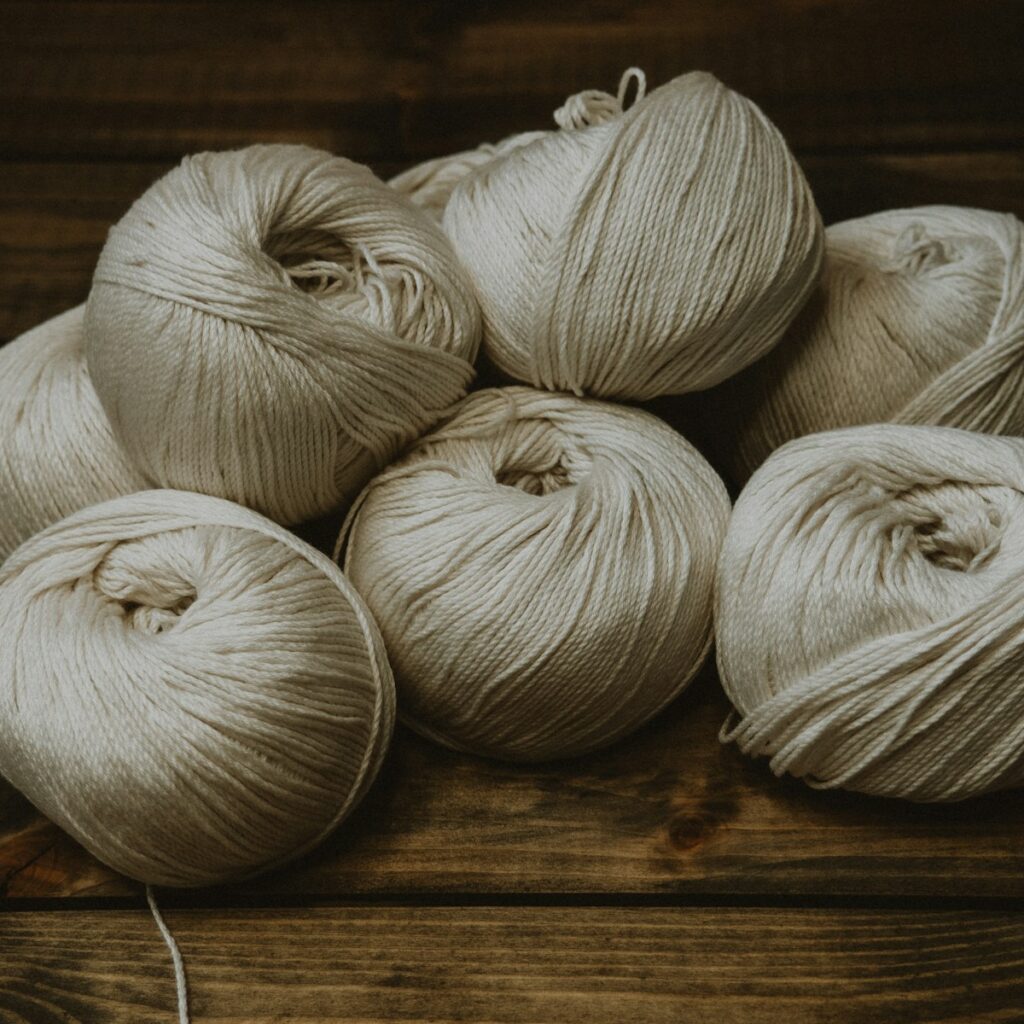 white garlic on brown wooden table